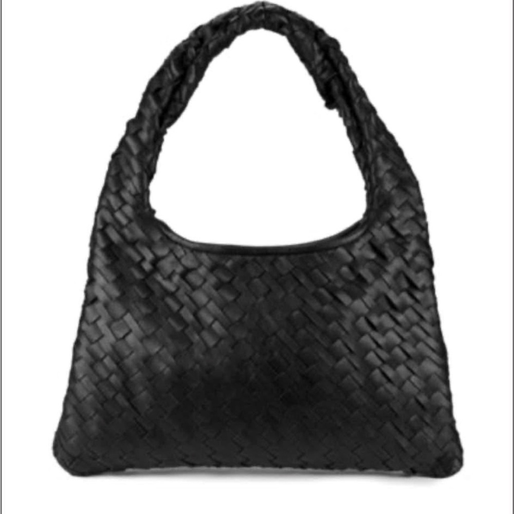 Black Brand new Walter Baker genuine leather purse. Never used. Tags attached.